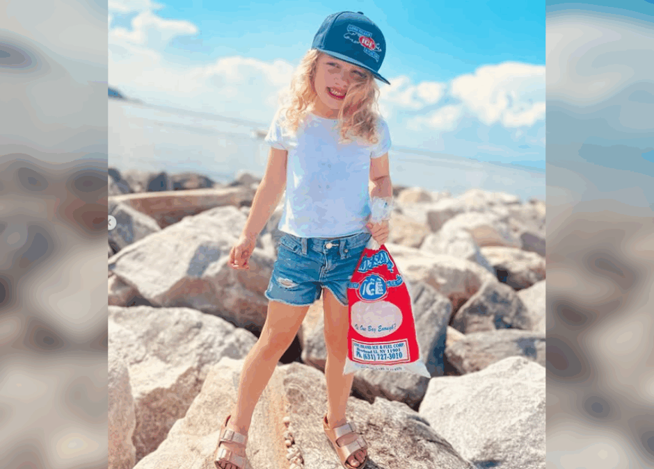Girl holding bag of packaged ice from Long Island Ice and Fuel of Suffolk County, NY