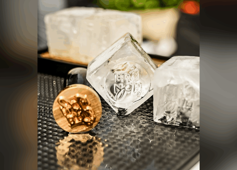 A closeup photo of custom gourmet ice cubes on a bar counter.